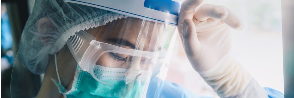 nurse wearing PPE for protection