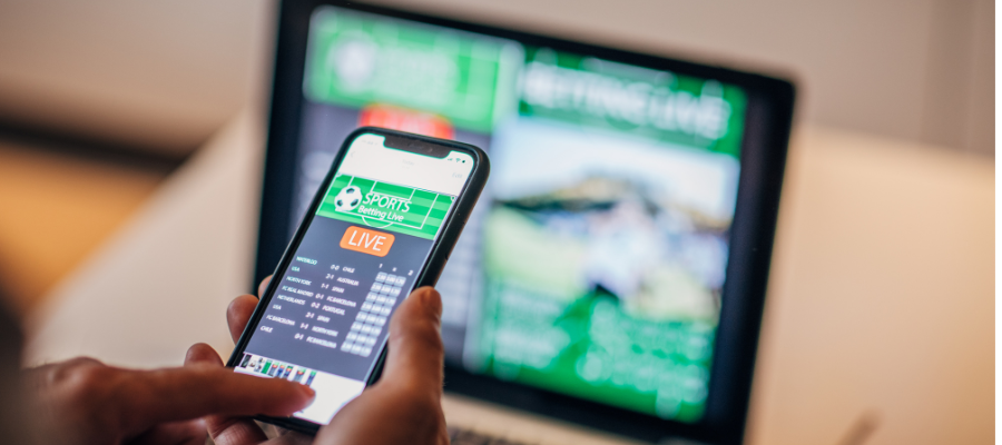 placing a sports bet on a smartphone